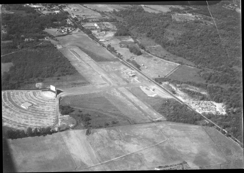 taken in summer around 8:15pm. the airport in front, looks like a big night at the skyview (a full house)