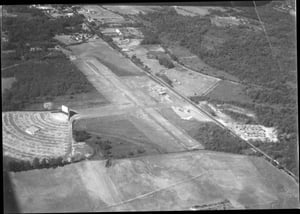 taken in summer around 8:15pm. the airport in front, looks like a big night at the skyview (a full house)