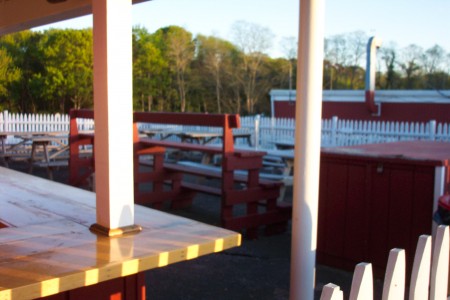 Beer garden between snack bar and projection booth.  It's only open during the flea markets.