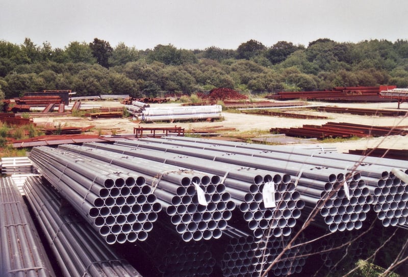 Bundles of tubes behind the fence