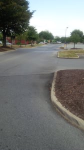 The original entry road comes in right next to the Wendy's. The original curbing is still there as seen in the other picture posted of the marque.