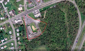 Google Earth image with former site outlined