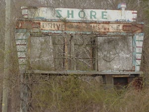 Entrance sign for Shore Drive-in Rt 50 located 3 miles West of Ocean City, Maryland. Broken neon still intact.