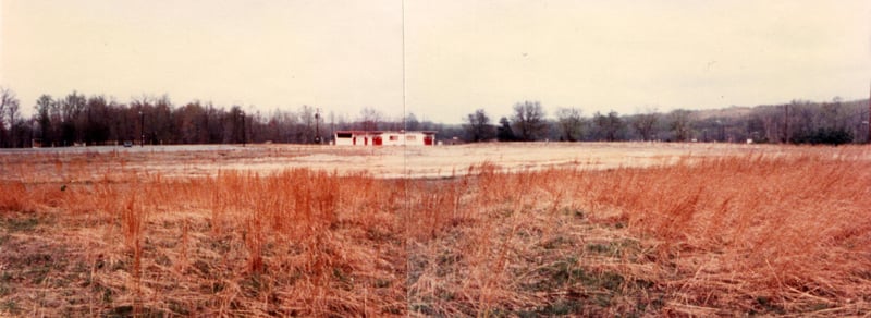Lavish playground, a Wineland trademark, once occupied immediate foreground.  Gray gravel lot in left rear of field served as parking lot/bus stop following theater's closing.  Field originally enveloped by thick woods all around.  Evident in this photo h