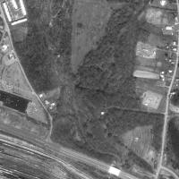 terraserver pic of Super 51. the ramps, rows, and the foundation of the original projection booth appear to remain there. also the projection bldg. itself and screen no longer stand.
