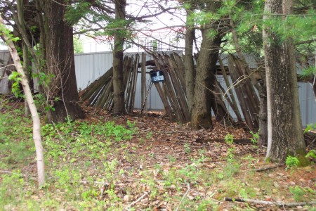 What's left of the perimeter fence.