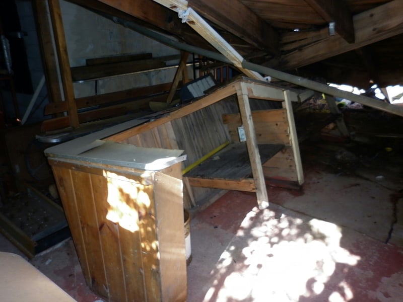 The collapsing roof above the snack bar destroyed the furniture