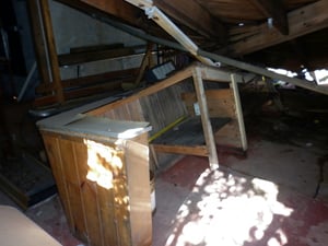 The collapsing roof above the snack bar destroyed the furniture