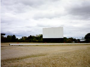 This photo was taken towards the back of the screen 2 lot. Screen 2 is to the left, the concession stand is in the center, and screen 1 is to the right.