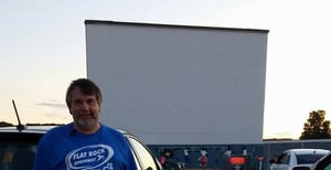 Screen tower with mural of cherries from the book Ticket to Paradise by John Margolies & Emily Gwathmey.