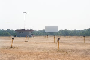 Screen, speaker poles and projection booth