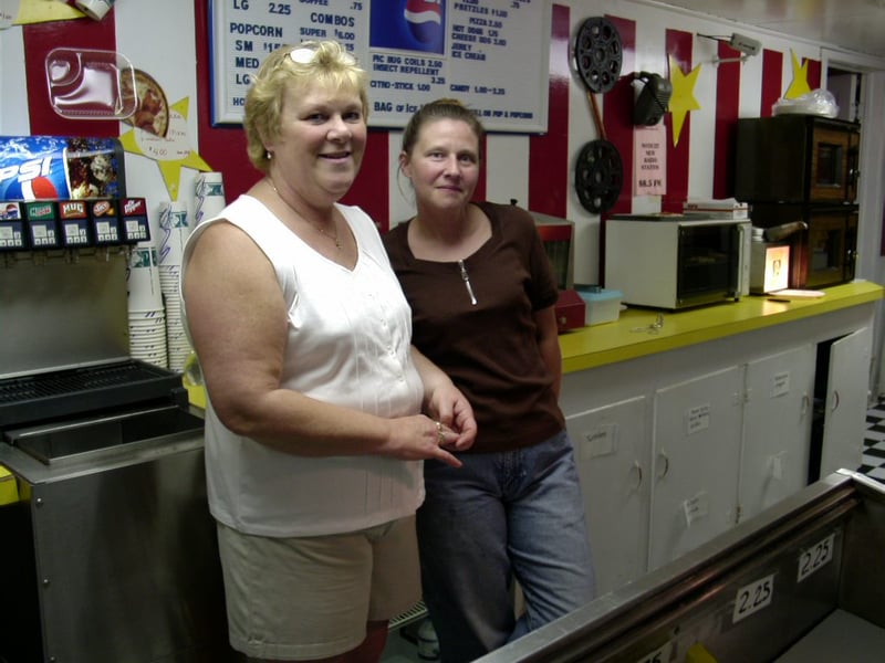 The owner Steve's mom Wanda and co-worker Starr in concession stand