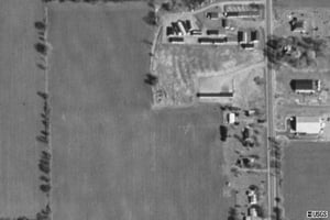 Terraserver aerial view of remnants. Ramps remain on about half the former field that wasn't taken by the mobile home dealer