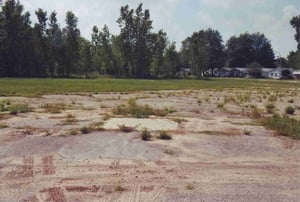 In the middle of the entrance road the concrete slab of the ticket booth still remains