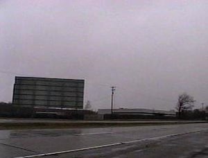 M-78 Drive-In Blue (south) Screen tower, and Super Cinemas hardtop on the left. Both screens were demolished November 17th, 1999.