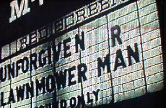 Vidcap of the M-78 marquee from the extensive archives of Outdoor Moovies, a Lansing public-access cable TV program produced by Darryl Burgess.