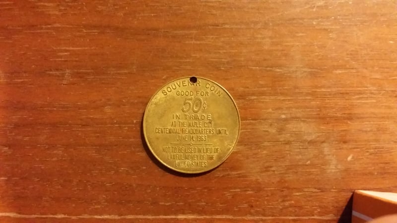 1963 souvenir coin back