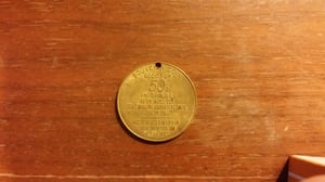 1963 souvenir coin back