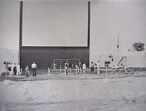 Starlite Drive-In screen tower, and playground, from the 1953 Theatre Catalog.