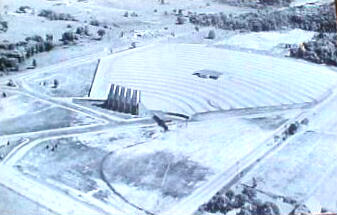 Postcard reads: West Beltline M-50 at US 16 "The showplace of the midwest"