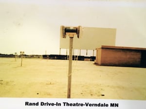 Rand Drive-In Theatre screen and concession building.