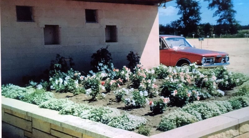 Rand Drive-In Theatre concession building flower garden.