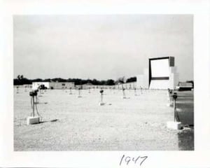 Submitted by Rosemary Strobel: screen and field with speaker poles