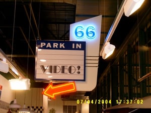 This is a sign directing customers to the video department of the Schnucks grocery store that was built on the site where the 66 Park-In used to stand. It is very similar to the drive-ins acutal marquee. It is also the only reminder that the 66 Park-In on