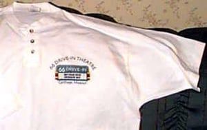 Memorabilia includes two different shirts, this button-tee...