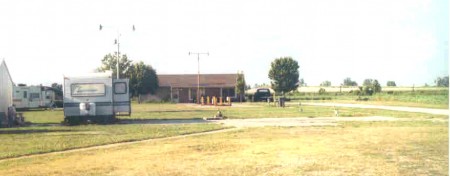 This is a picture of the screen tower foundation and the projection house. Area now used for tailer storage and/or sales.