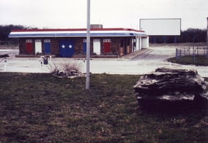 View behind projection/concession building towards screen