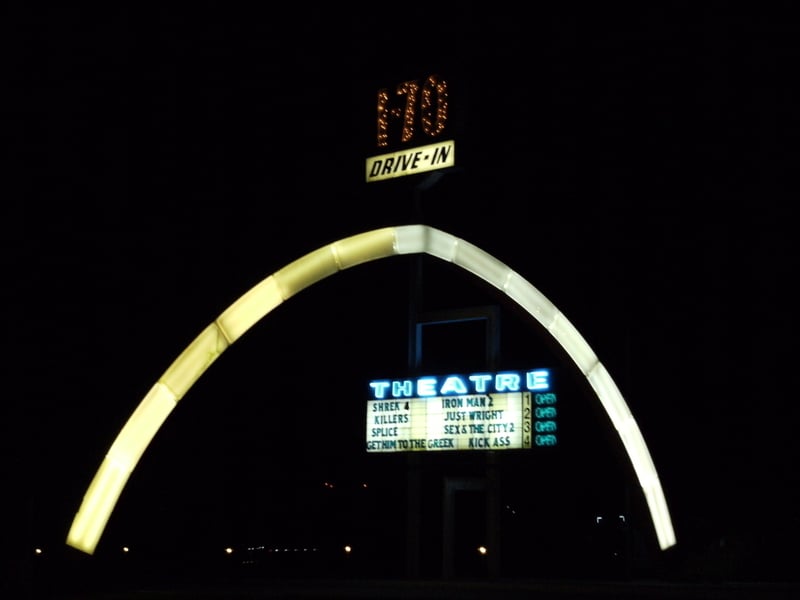 Sign lit up at night