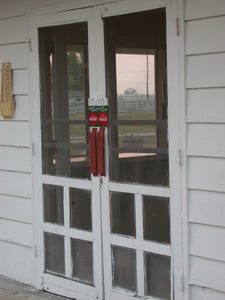 Doors with Coca-Cola handles...prepare to be refreshed!