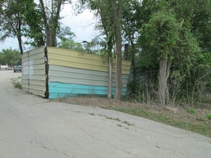 Another picture of entrance and to the right side is a tree that in the spot of the old ticket booth.