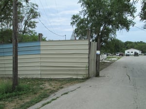 Picture of West side of entrance. I was told by the owner of salvage yard they tore down the ticket booth when they bought the land.