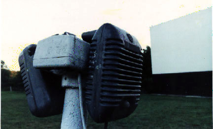 speaker with screen in background; taken May, 2000