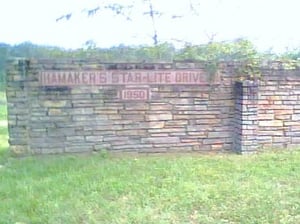 All thats left is a real nice rock wall and the ticket booth which is also rock. note the fancy inscription...
