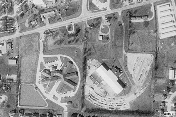 Terraserver aerial view of remnants. Some ramps are still visible, but there is now a large building in the middle of the former field.