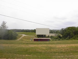 Picture of the Drive-In from the back row.  No speaker poles and the buildings are repainted.