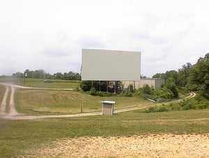 Picture of the ticket booth and the screen. The screen was knocked over by wind in 2006 and replaced with better materials.