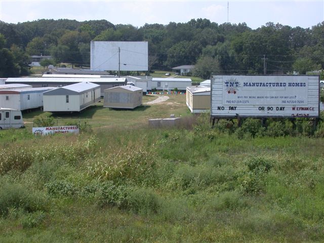 trailer sales business with screen in background