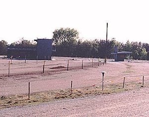 projection/concession building, and side view of ticket booth + lot