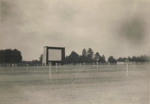 Photo of the Original Drive in 1950 before they had in car speakers or wide screen, the screen was later widened for cinescope. notice speaker on post..