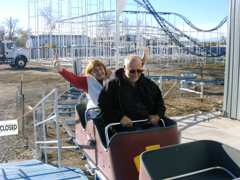 Several drive-in owners,from Raleigh Road in NC and the Starlite in Wis, try out one of two roller coasters at the theatre. This one goes around the screen tower.