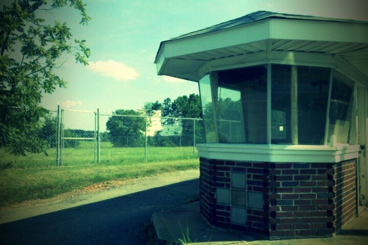 Looking past the ticket booth to see the screen.