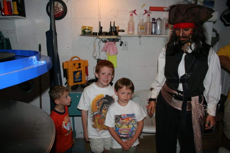 The theatre has a guest projectionist program for birthday children. Here Capt. Jack also in attendance gets ready to start the night's films