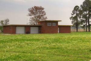 This building was the projection booth for the South 17 Drive-in,that closed sometime after 1976.