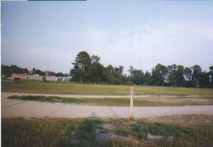 Facing where the screen once stood.