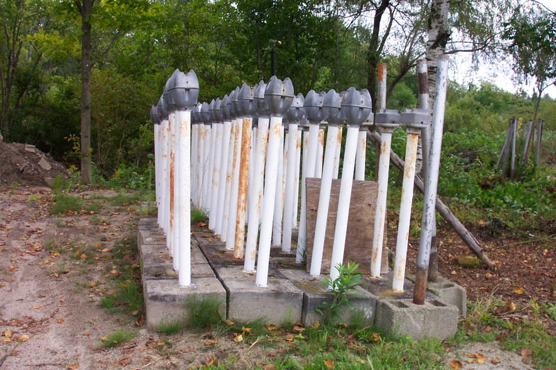 Pile of speaker poles, never to serve again?