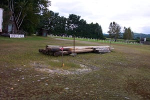 Former screen tower support poles.